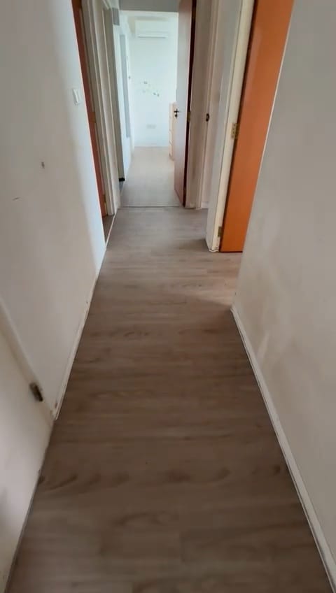 Home Hallway after installation of new vinyl floor.